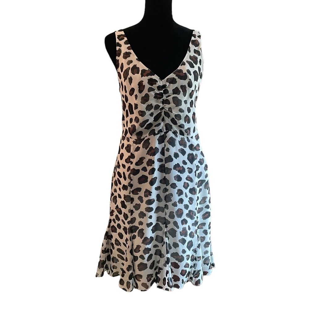 Kate Young woman’s animal print sleeveless‎ dress.